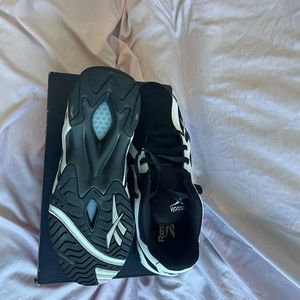 Like new condition black suede white leather